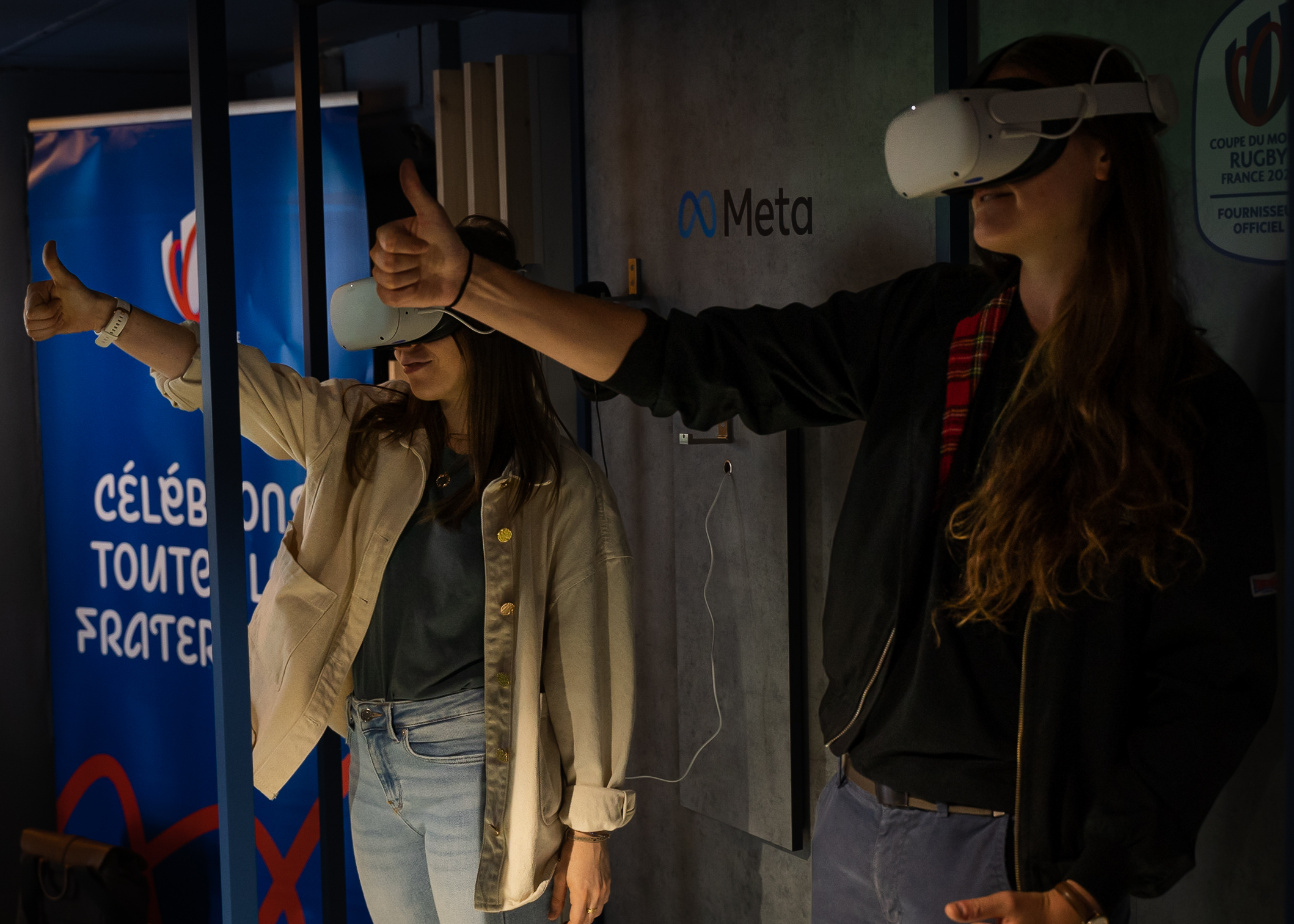 two women using Meta Quest 2 headset